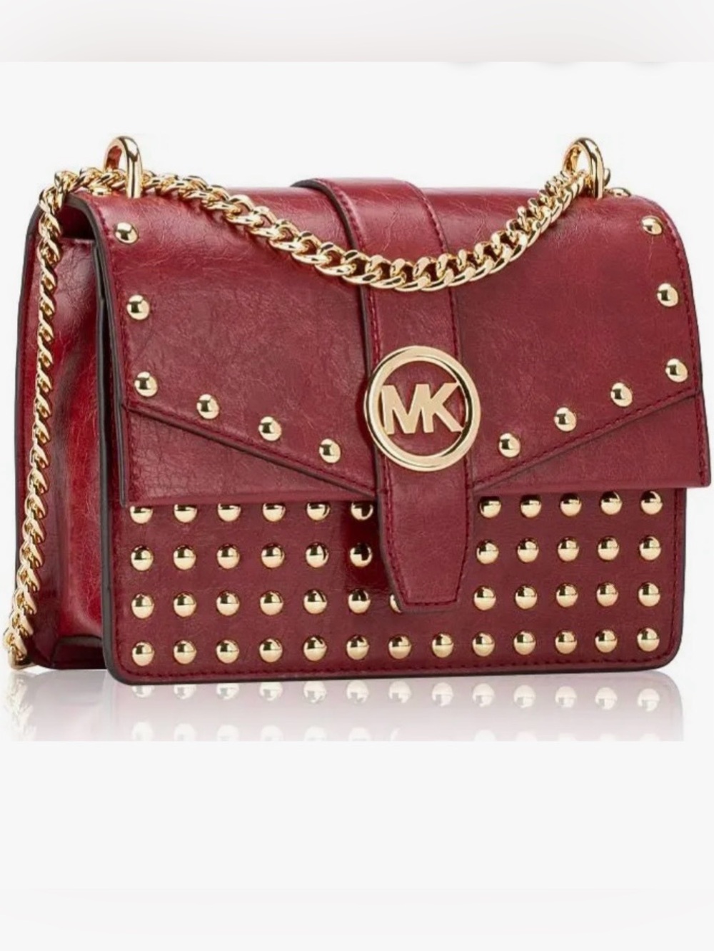 Micheal Kors Greenwich studded distressed crossbody bag.